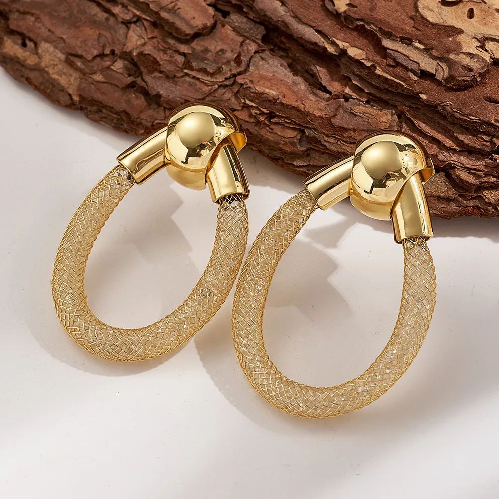 Aretes dorados circulares circonias en malla